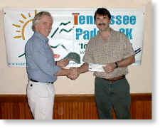 Jimmy Groton (right), an environmental scientist with Science Applications International Corporation (SAIC) presents Dale Robinson (left), Team Leader of Tennessee Paddle, with a check for $485.  Click here to find out more